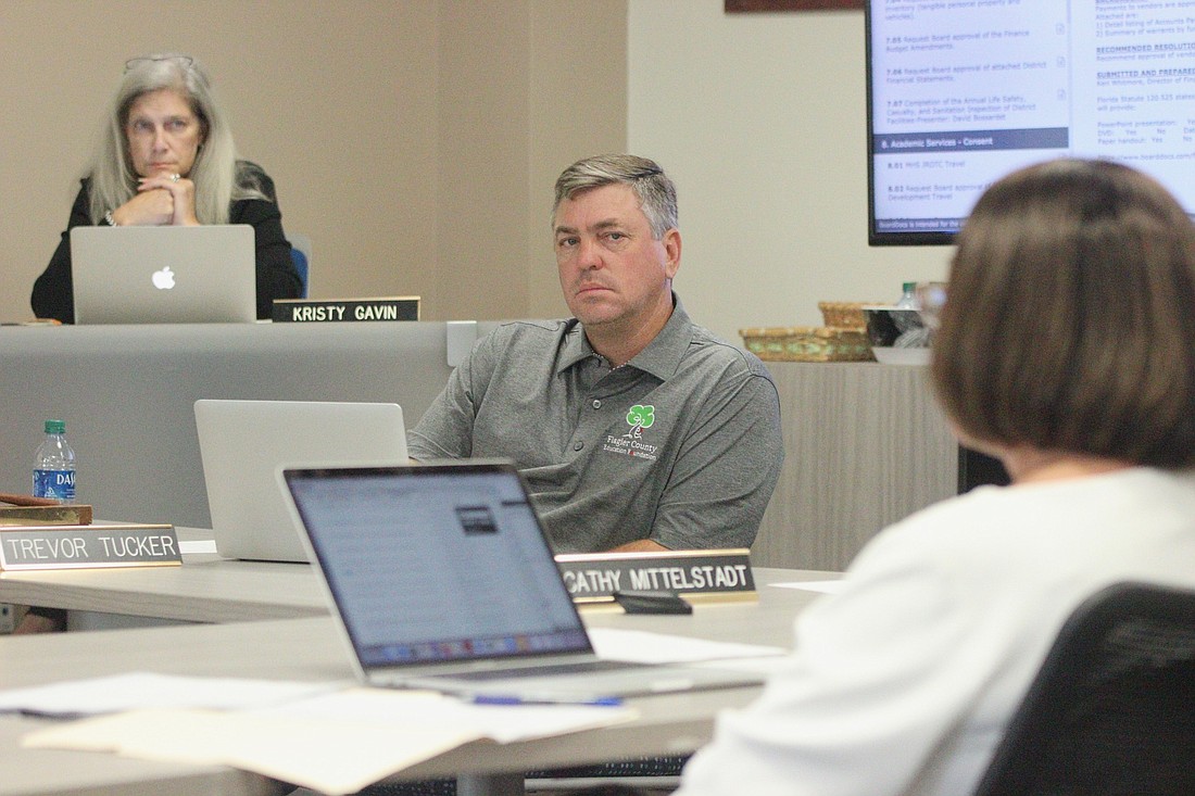 School Board member Trevor Tucker listen during a board workshop. File photo