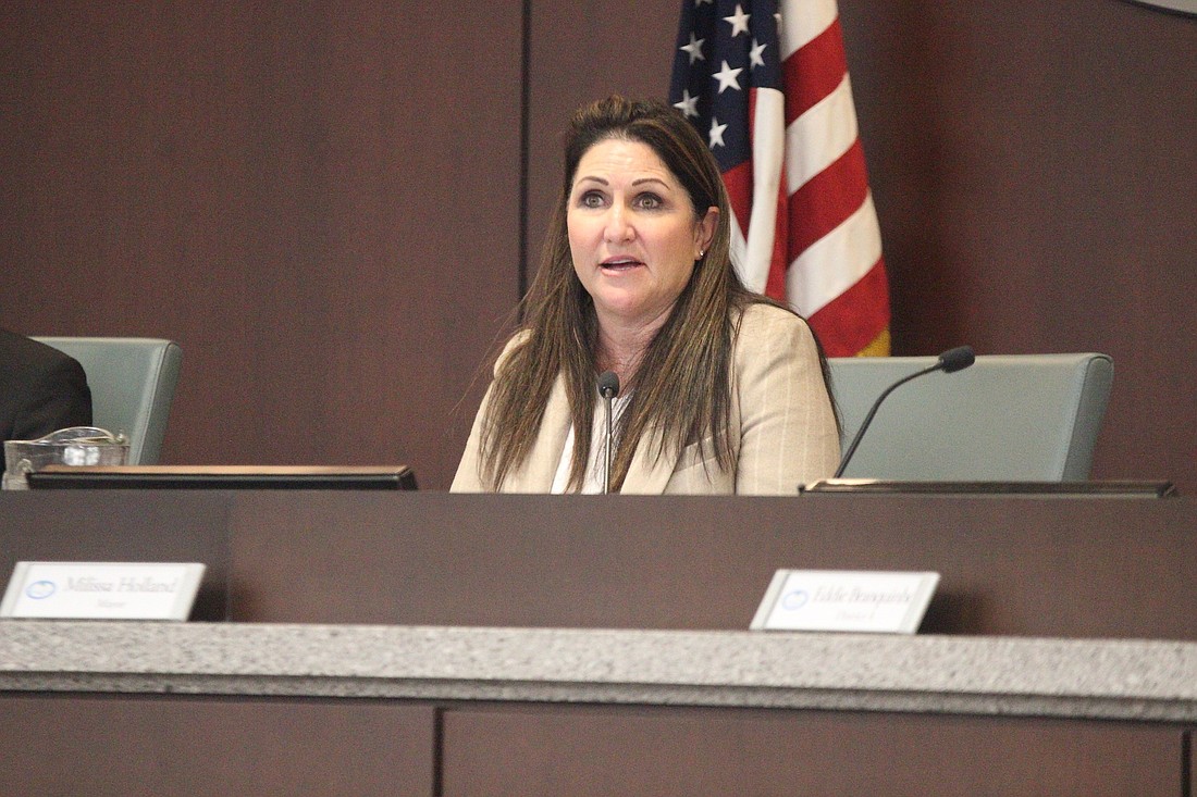 Former Mayor Milissa Holland speaks at a Palm Coast City Council meeting. File photo