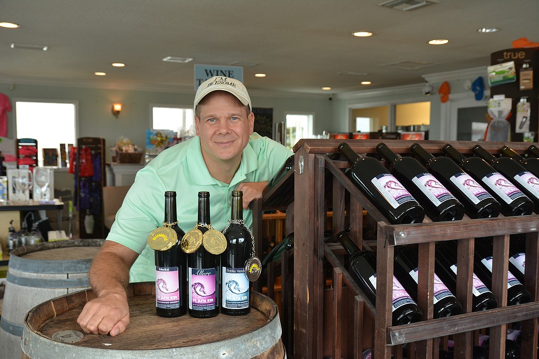 Flagler Beach Winery owner Ken Tarsitano describes his recent winnings as "the proof is in the pudding."