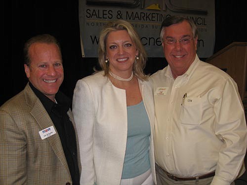 Visiting Tampa SMC member Jim Schafer; guest speaker Kimberly Mackey and of Creative Sales Solutions; and Sales and Marketing Council President Cal Williams during February's SMC meeting.