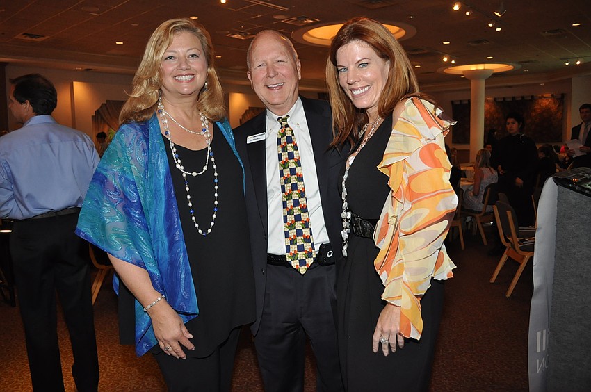 Co-Chair Susan Brennan, Emcee Scott Anderson and Co-Chair Renee Phinney