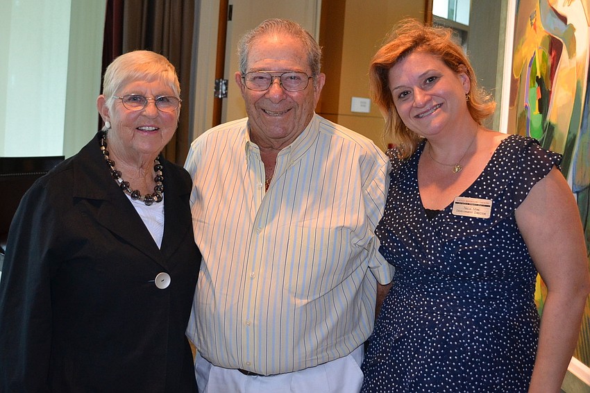 Margo and Warren Coville and Tricia Mire