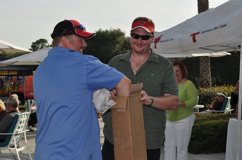 Troy Cawthorne and Brian Doerner think theyâ€™re opening a box of golfing irons, but soon realize they're opening the free-wrinkles-from-clothes type of irons...