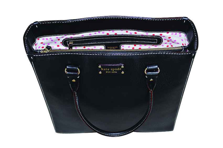 KATE SPADE
<br><br>
â€œI needed a simple but fun bag for work. I love that the inside is filled with polka dots and that my laptop fits. Plus, it was a bargain because I got it at the outlet