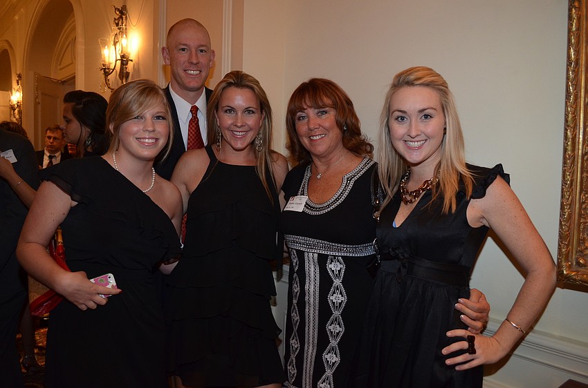 Sadie Montanus with 
T.J. and Jackie Caouette, Robin Gruters and Sally Gruters