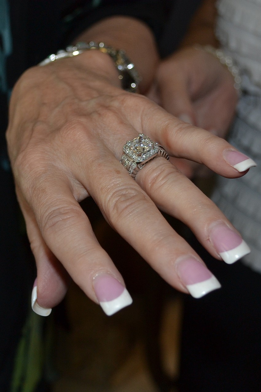 Ooooh!  Ahhhh!  Jean's engagement ring.