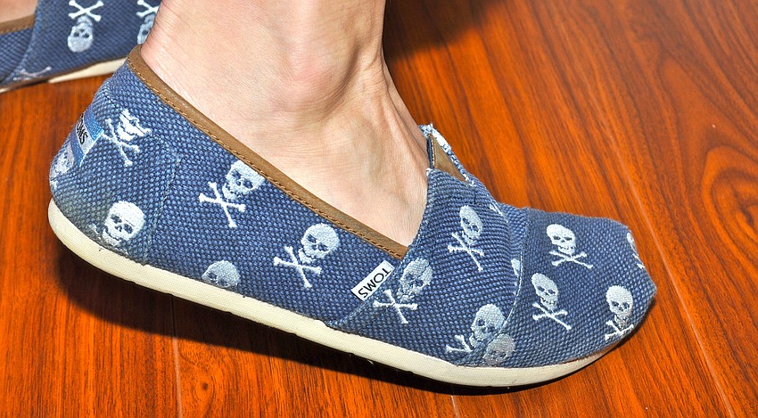 Chris Ostoich is wearing limited edition Tomâ€™s from Neiman Marcus.