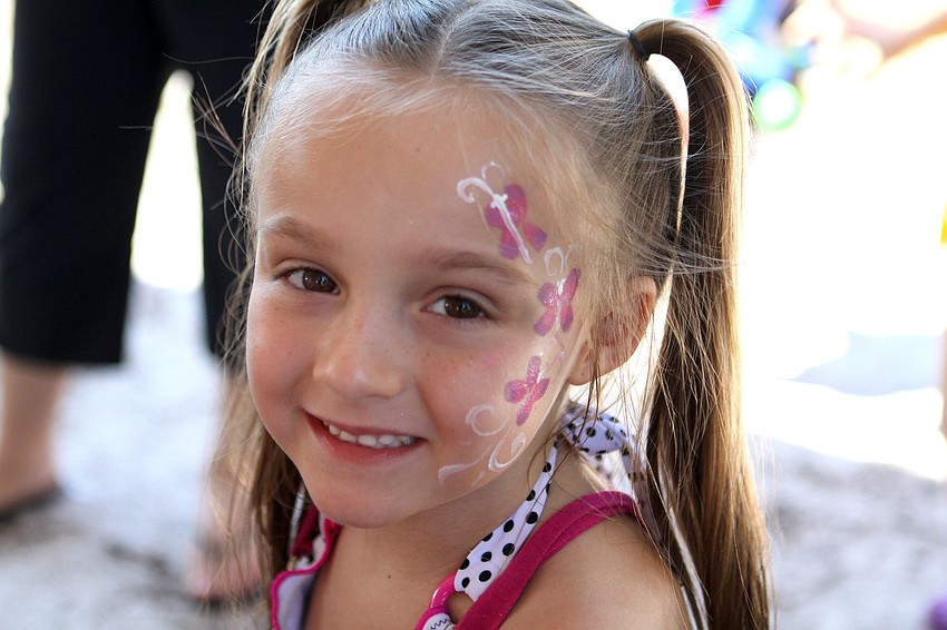 Violet Walsh, 5, had flowers painted on her face.