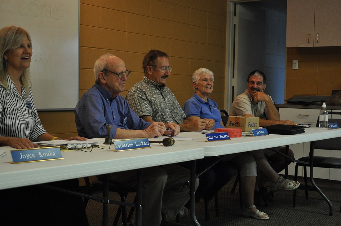 Siesta Key Association board members share a laugh during the organization's June meeting.