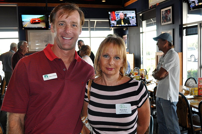 Chris O'Brein of Atlas Insurance and Moya Nunn of Just 4 Paws