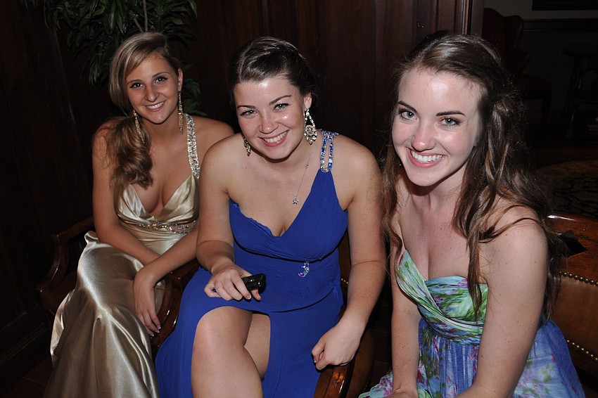 Emily Greenwood, Natalie Rodriguez and Kelly Doyle had their caricature drawn.