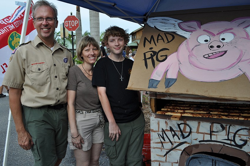 River Club resident Michael Meiser, right, served up his best barbecue with the help of his parents, Mike and Theresa.