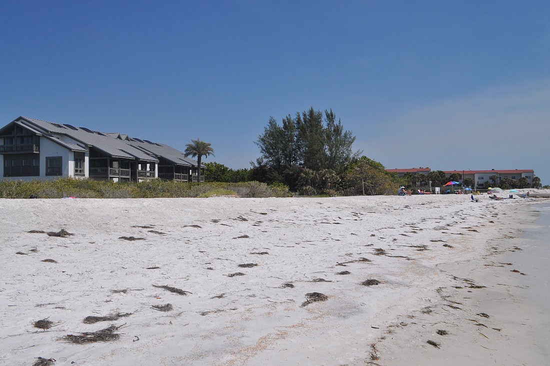Town officials estimate that 30 to 50 feet of dry beach remain between the Gulf and 360 North condominiums.