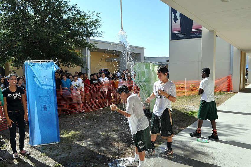 Students were challenged to bathe with only five gallons of water, using their homemade showerheads.