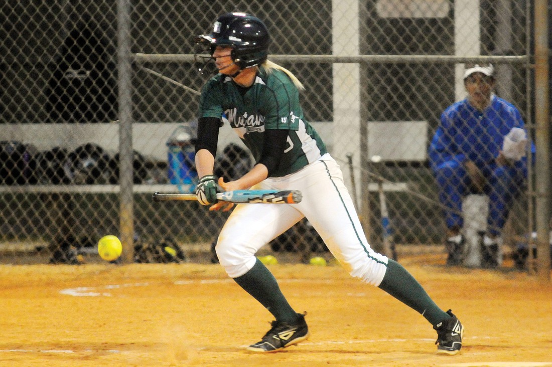 Lakewood Ranch High senior Quillan Toler lays down a bunt during the sixth inning of the Lady Mustangs 7-0 victory over Tampa Jefferson in the Class 6A-District 12 quarterfinals April 24.