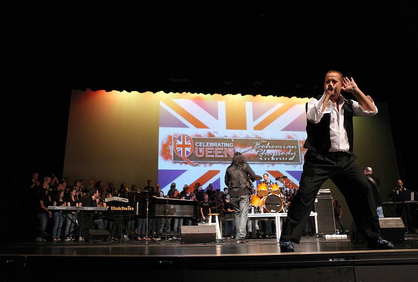 JJ Midnight took center stage and rocked out with the band and the Riverview High School Choir during â€œWe are the Championsâ€.