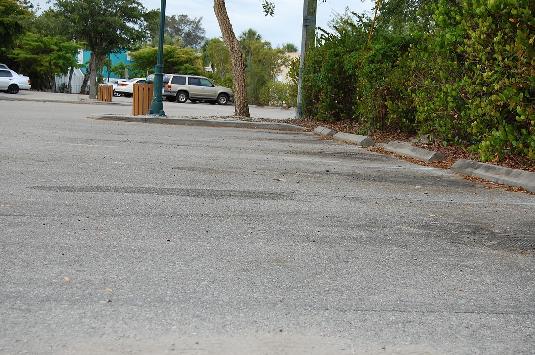 Village maintenance was one of the hot topics at the monthly SKA meeting. The parking lines have nearly vanished from this municipal parking lot behind Siesta Market.
