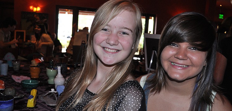 Jordan Ehmke and Ashley Burnett checked out clay artwork.