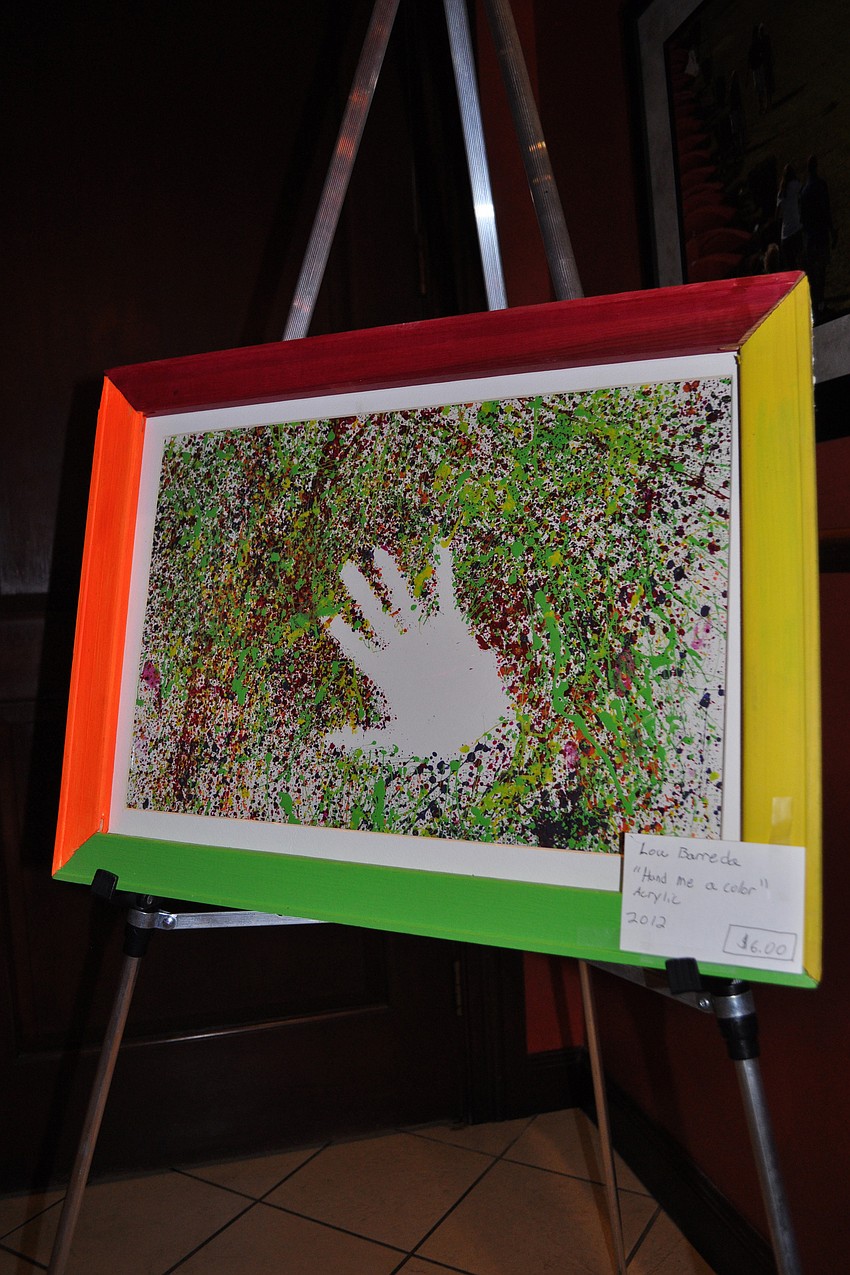 Lou Barreda completed this acrylic painting, titled 