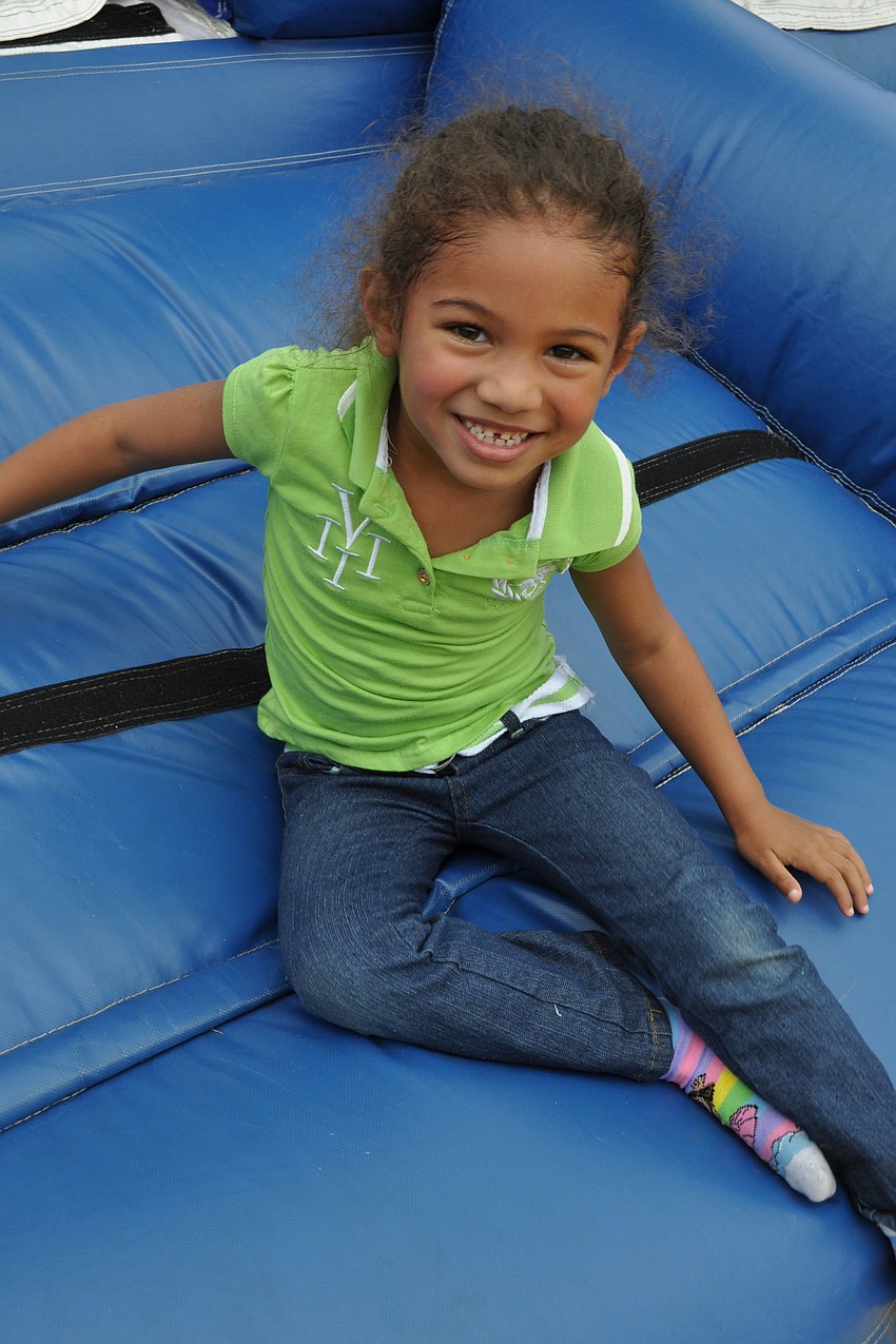 Aisha Cornelius, 5, had fun going down the slide.
