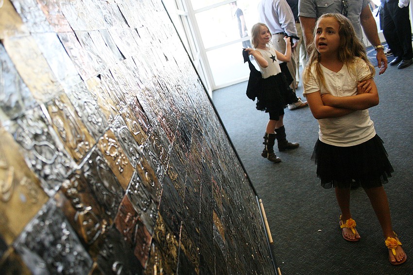 Attendees enjoyed perusing the art display, which featured work from pre-kindergarten through 12th-grade students.