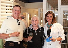 Vincent and Lynn Billing pose with Harold Kendall, Friday, May 4, inside RCC design and studio on Palm Avenue.