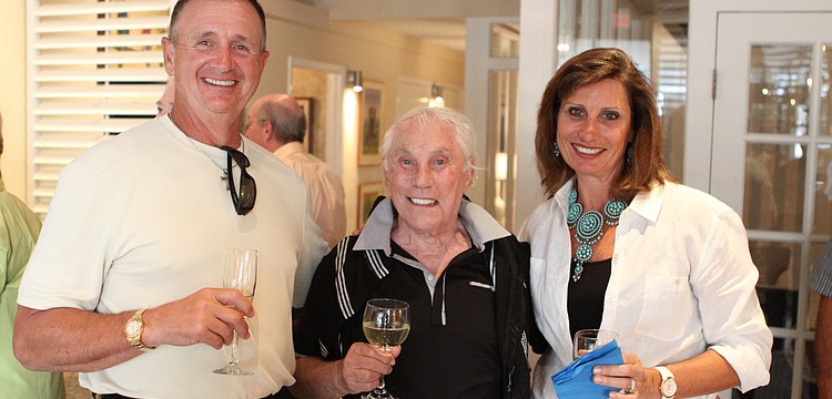 Vincent and Lynn Billing pose with Harold Kendall, Friday, May 4, inside RCC design and studio on Palm Avenue.