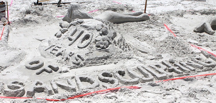 One group wrote out â€œ40 Years Of Sand Sculptingâ€ and incorporated it into their piece, Saturday, May 5.