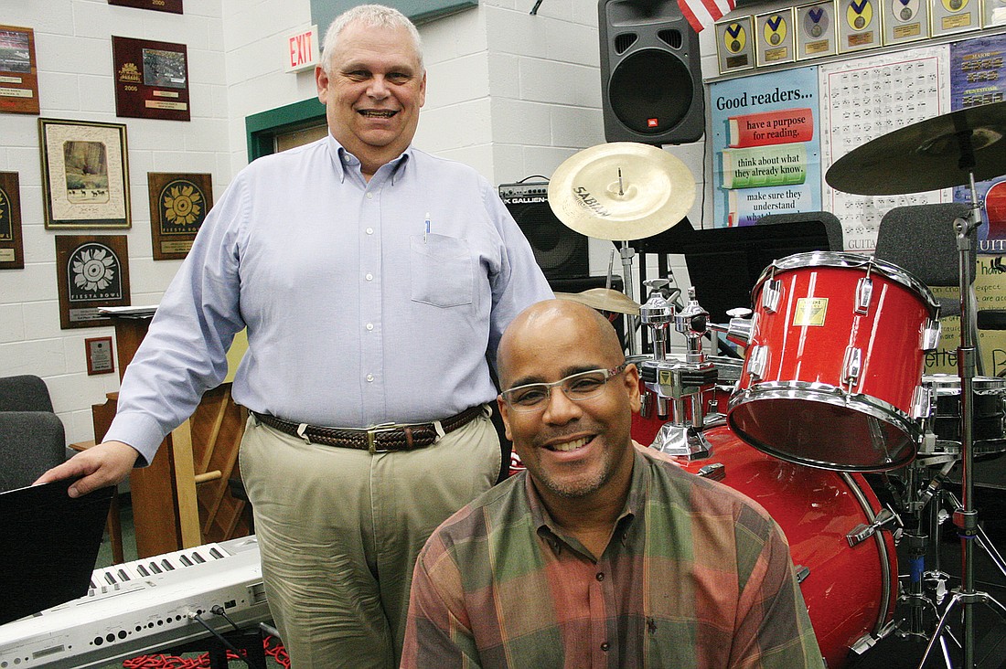 Lakewood Ranch High School Band Director Bob Schaer, left, said he knew almost immediately he wanted Ron Lambert to succeed him as the head of the Mustang band program.