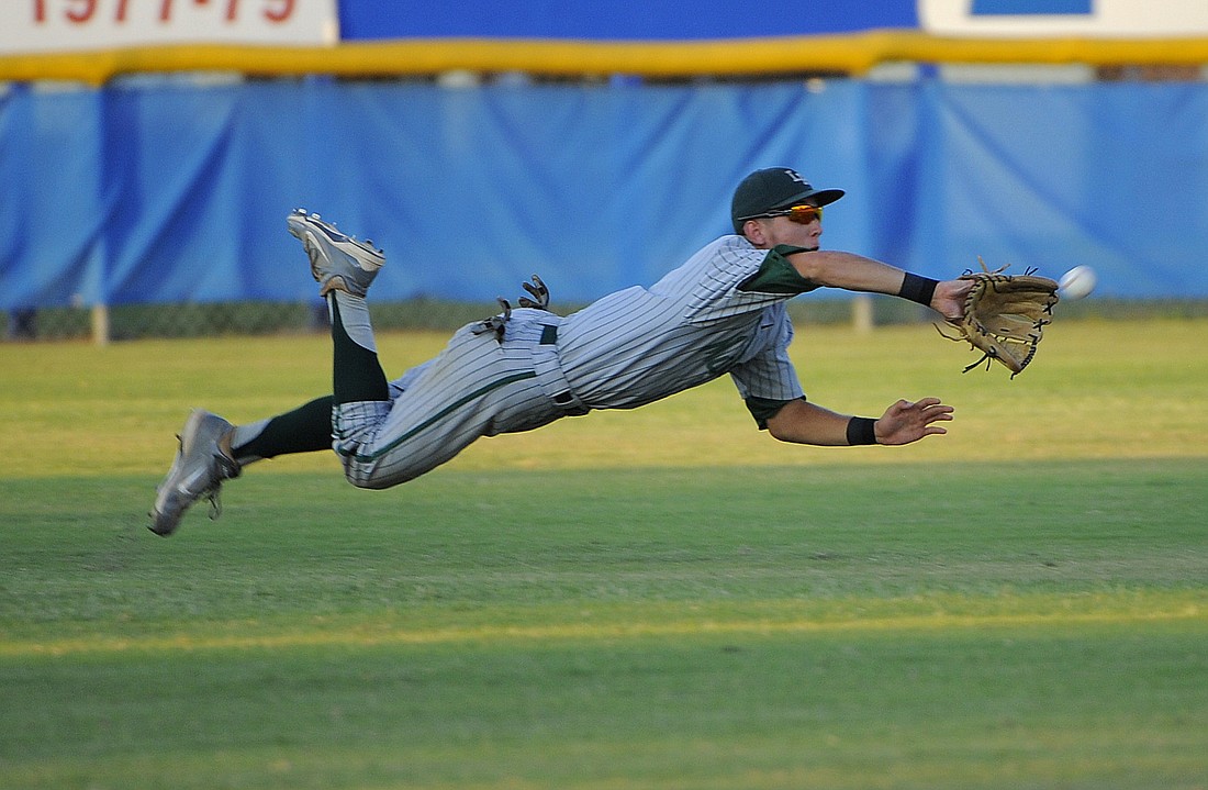 Lakewood Ranch left fielder Brandon King makes a diving catch to end the second inning.