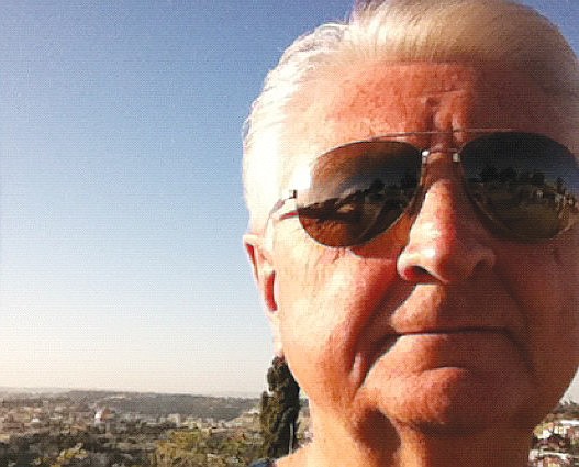 Dr. Rich Swier Sr. photographed himself with Sarasota's sister city in Israel, Kiryat Yam, behind him.