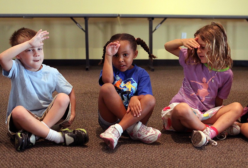 Aidan Oâ€™Callaghan, Franki Magnotti and Chloe Macculoso pretend to look around the room during a song, Wednesday, May 9.