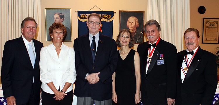 Honorees Scott Bill, Mary Potter, Jay Foutty, LTC Pam Meyers, Sal Naimo pose with Tom Dineen, Saturday, May 12, at the 29th Annual Patriotic Ball at the Knights of Columbus Hall.