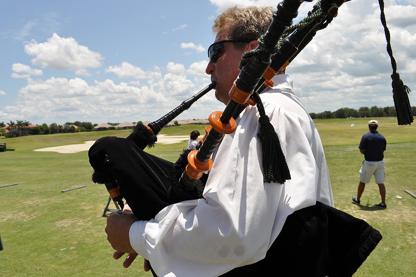 Gary Reinstrom, of the Jacobites Pipe & Drum Band, kept the mood lively as the golfers began the tournament.