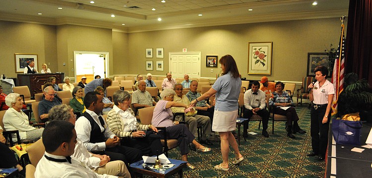 Jennifer Walker interacts with the contestants.