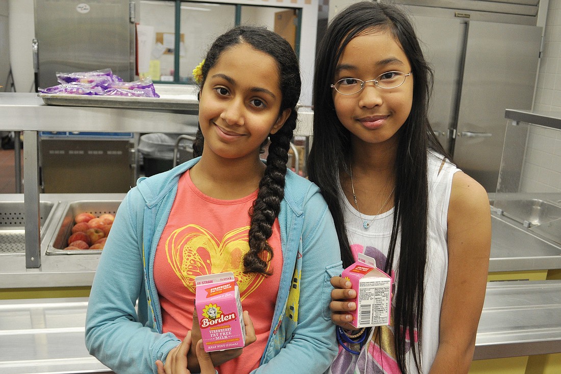 Gene Witt Elementary students Ashreeti Sharma and Yohki Paschalidis, both 11, are grateful to have strawberry milk in their cafeteria again.