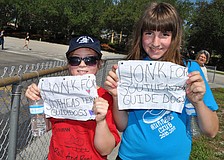 Paulina Medrzycki and Kirsten McGlaun earned about a dozen honks with their signs.