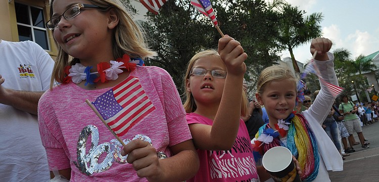 Lauren, Brooke and Kate Frederick cheered on the parade participants.