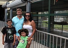Chris and Georgia Meredith with their sons John, 9, and Matthew, 4, Saturday, May 26. Meredith is in the air force.