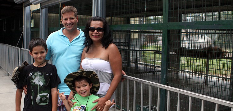 Chris and Georgia Meredith with their sons John, 9, and Matthew, 4, Saturday, May 26. Meredith is in the air force.