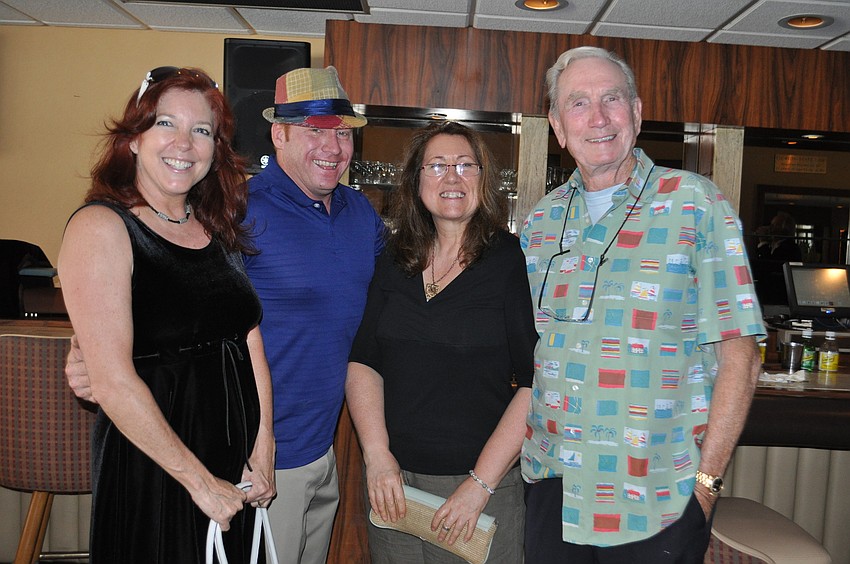 Leslie Harris-Senac with Visions Unlimited Video Productions, Robert Dinan with TRVST, Susan Tower with Company Peas Design and real estate agent Howard Rooks