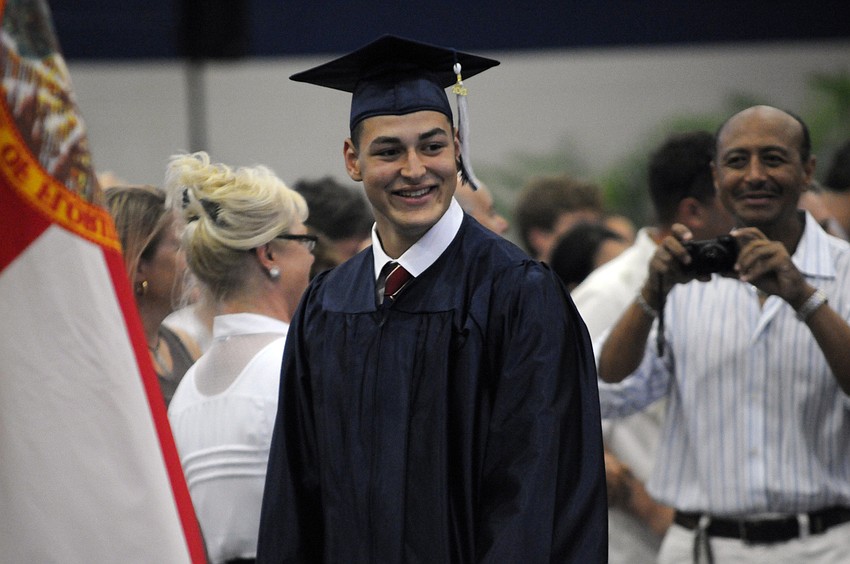 Ryan Agabani led the senior processional.