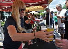 Amber Lynch poured guests beer samples.