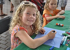 Kate Carver colors a fish