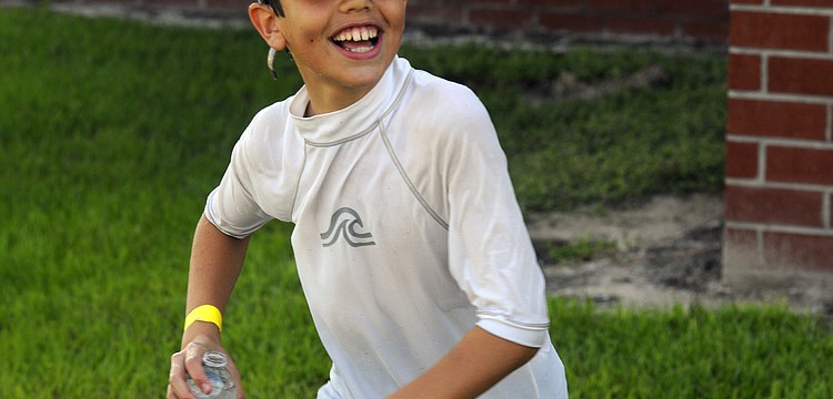 Ten-year-old Dylan Welch couldnâ€™t contain his excitement as he snuck up on one of his teachers with a water bottle.