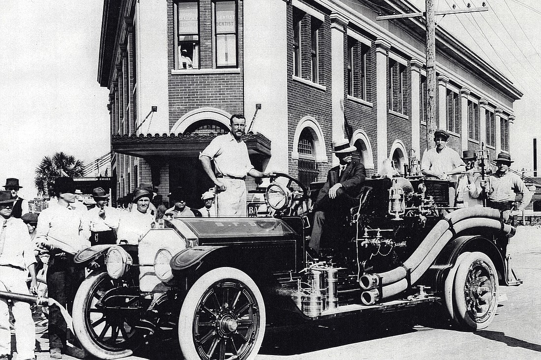Fire Chief Henry Behrens stands atop the new Armstrong LaFrance fire truck in 1912 on South Pineapple Avenue. Photos courtesy of the Sarasota County History Center.