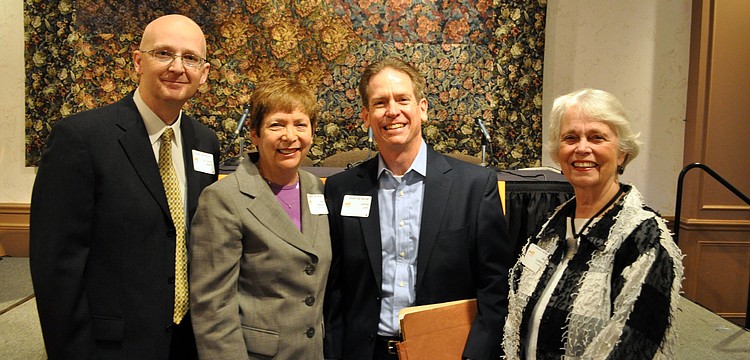 Speakers Dr. David Matkin, Nora Patterson and James Linn stand with Tiger Bay president Mollie Cardamone.