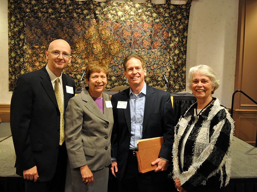 Speakers Dr. David Matkin, Nora Patterson and James Linn stand with Tiger Bay president Mollie Cardamone.