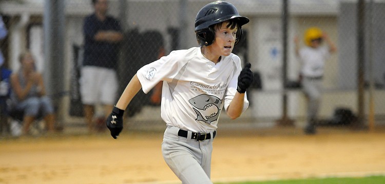 Cooper Corley, 11, hit a RBI double for Carroll and Sutton.