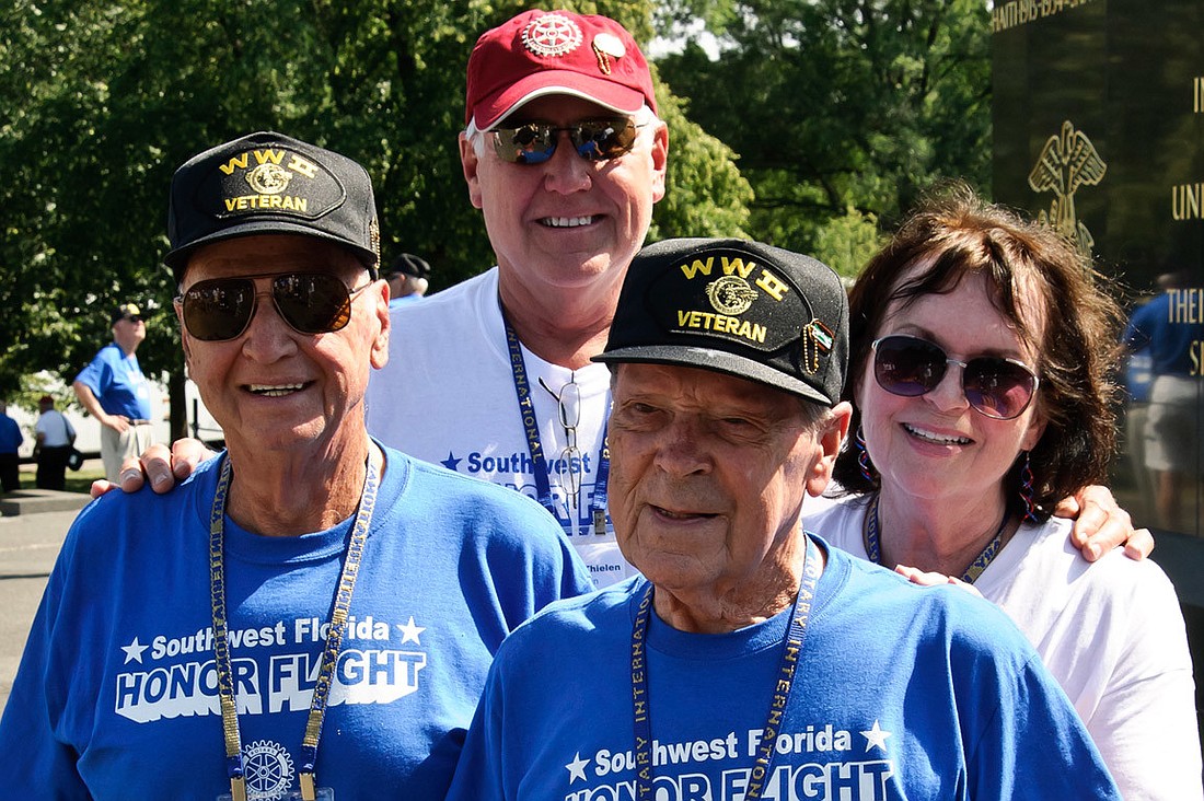 World War II veterans Tony Lingrosso and ElRoy York traveled with their guardians, Marins Richard and Avone Thielen. Photo by Keith Millard, of Keith A. Millard Photography.